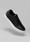 black synthetic leather sneakers in contemporary design floating sideview