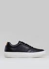 black synthetic leather sneakers in contemporary design sideview