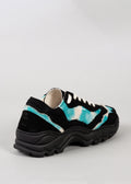 black and tie dye aqua green premium canvas sneakers landscape with sophisticated silhouette backview