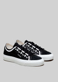 black and white premium canvas multi-layered low sneakers frontview