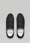 black with white premium leather slip-on sneakers with straps in clean design topview