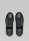Un par de V2 Blue Floater slip-on sneakers con tirantes ajustables, presentados sobre un fondo neutro.