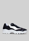 color mix black and white premium leather sneakers landscape with sophisticated silhouette sideview