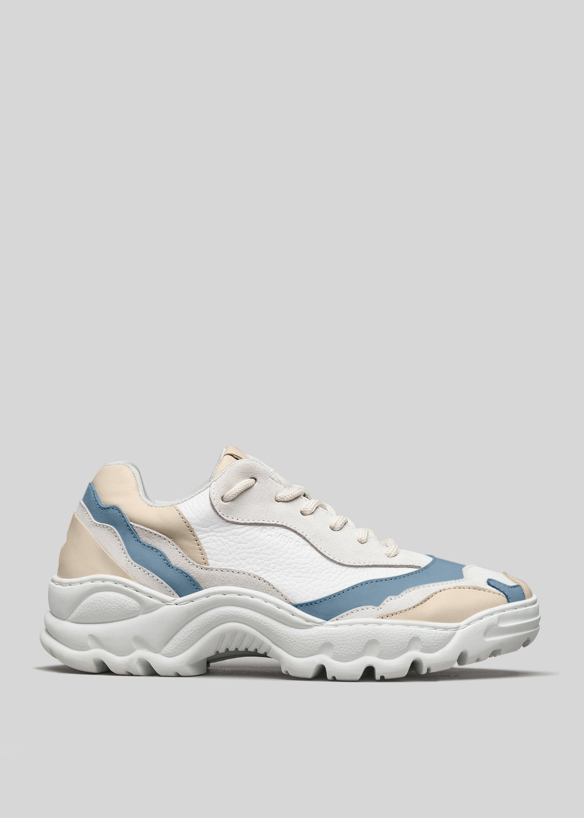 White, blue, and beige L0009 MAYATHE low top sneaker with a chunky sole, displayed against a plain gray background.