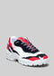 Una moderna sneaker low top con pannelli rossi, neri e bianchi, suola bianca ondulata e lacci neri. 
Nome prodotto: L0001 di Soraia