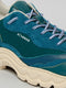 Close-up of a DIVERGE X BUREL Teal low-top sneaker with textured overlays and white laces, featuring the logo "d-verge" on the side.