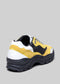 color mix yellow, black and white premium leather sneakers landscape with sophisticated silhouette backview