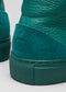 Close-up of V2 Emerald Green Floater with a textured suede heel and smooth leather upper.