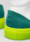 Close-up of V34 Forest W/ Yellow high-top sneakers with teal suede heel detail and a bright yellow rubber sole.