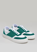 green and white premium leather sneakers in contemporary design frontview