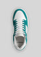 Top view of a single V1 Emerald Green W/ White low top sneaker with laces on a gray background.