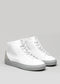 Un par de V39 White W/ Grey high-top sneakers sobre un fondo gris neutro.