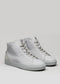 Une paire de chaussures montantes V7 Grey Floater sneakers avec lacets, présentées sur un fond gris clair.