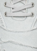light grey premium leather sneakers landscape with sophisticated silhouette close-up materials