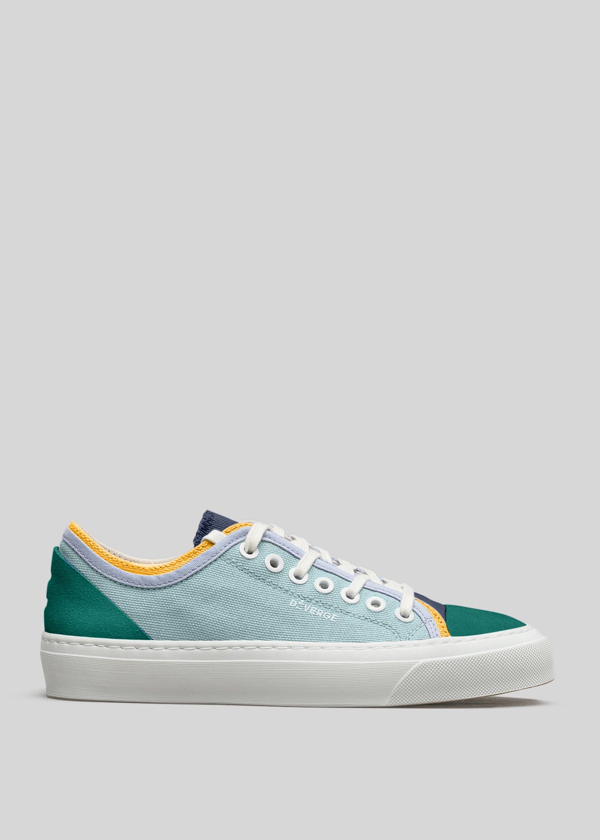 A single TL0004 by Ana with a gradient design transitioning from light blue at the toe to dark green at the heel, featuring white laces and a white sole.