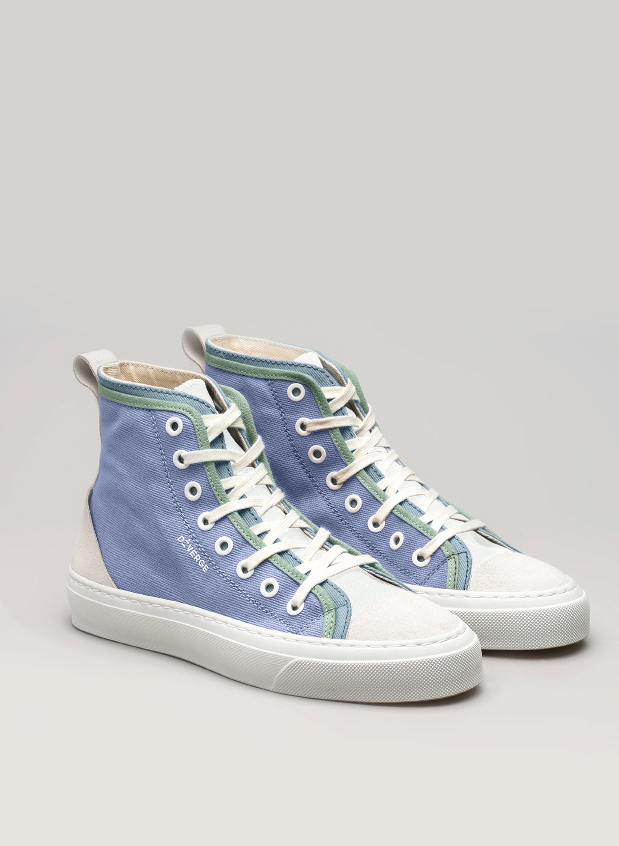 Blue and green high top Diverge sneakers with white laces, a pair of custom shoes.