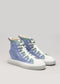 A pair of TH0003 by Eduarda high-top canvas shoes with blue and white tones and striped green accents, displayed against a neutral background.