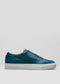 A single V15 Ocean Blue Leather W/ Grey low top sneaker with white soles on a plain background.