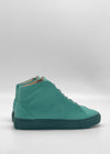 The MH0145 Pastel Green W/ Black sneakers are handcrafted in Portugal from premium Italian leathers, featuring a smooth finish on a plain white background.