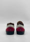 Rear view of ML0139 White W/ Red sneakers showcasing red suede heel accents and black soles, handcrafted in Portugal, against a plain white background.