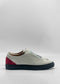 The ML0139 White W/ Red sneakers, handcrafted in Portugal, feature a red heel accent and blue soles. Made from premium Italian leathers, they are showcased in a side view against a plain white background.