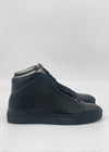 The MH0160 Black shoes are black high-top sneakers with matching soles, crafted in Portugal from premium Italian leathers, shown from the side on a plain white background.