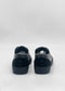 Back view of SO0060 Black Floater shoes against a plain white background, highlighting heels and soles. These elegantly handcrafted footwear pieces boast premium Italian leathers, offering unparalleled quality and style.
