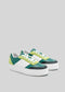 Une paire de N0015 by Jéssica vegan sneakers avec des panneaux verts, sarcelles et jaunes sur un fond gris.