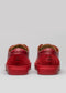 Paire de chaussures basses en cuir V3 Red Wine sneakers vues de l'arrière sur fond gris, avec logo visible.