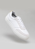 white and bone premium leather sneakers in contemporary design floating sideview