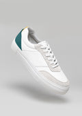 white_and_emerald_green premium leather sneakers in contemporary design floating sideview