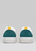 white_and_emerald_green premium leather pair of sneakers in contemporary design backview