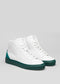A pair of V11 White Leather w/ Green high-top sneakers with emerald green soles and detailing, displayed against a gray background, these custom shoes stand out in any setting.