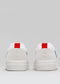 Vue arrière d'une paire de baskets V9 White & Petrol Blue sneakers avec des languettes rouges, présentées sur un fond gris clair.