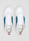 A pair of V9 White & Petrol Blue low top sneakers with white laces, viewed from above on a gray background.