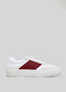 White low top sneaker with a burgundy stripe and a thick sole, viewed from the side against a light gray background.