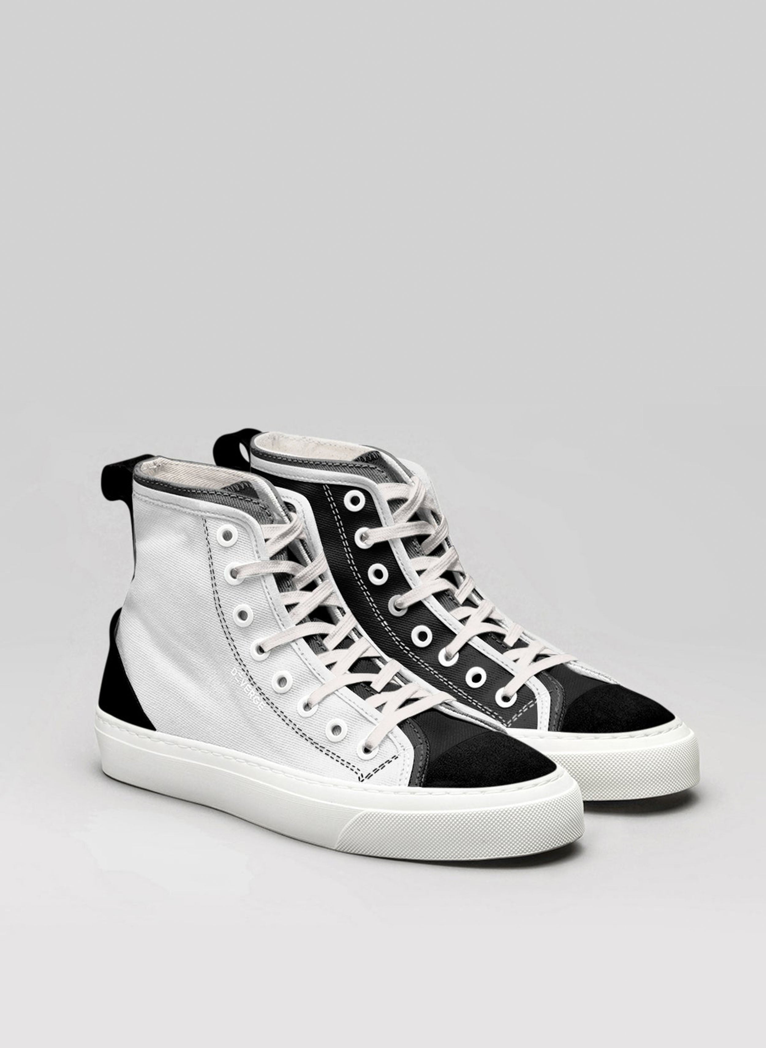 A pair of white and black high top sneakers, showcasing custom shoes by Diverge.