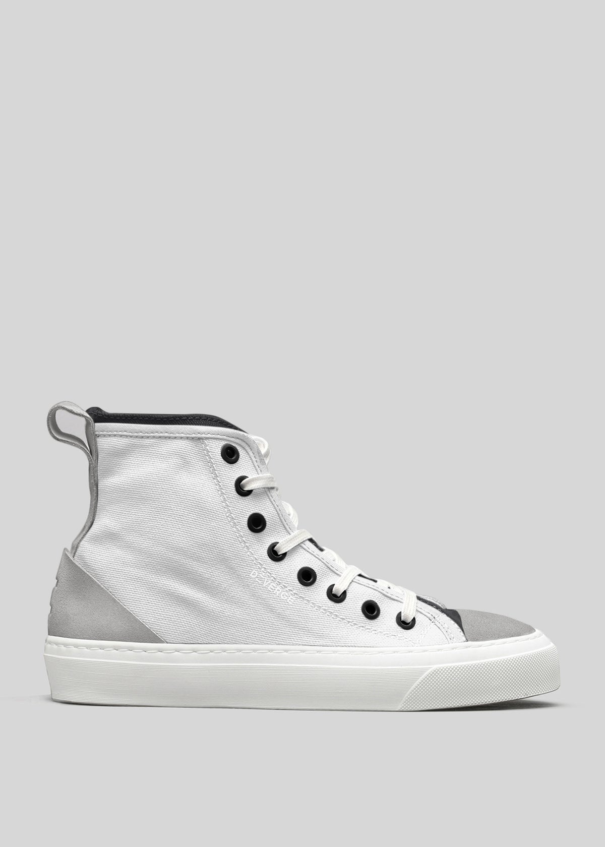 A TH0011 by Joana in white with black laces and a rubber sole, displayed against a gray background.