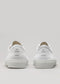 Vue arrière de deux toiles blanches Start With a White Canvas sneakers sur fond gris, montrant le talon arrière avec un petit logo circulaire.