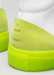 Close-up of a MH0018 White'n'Lime Power featuring a bright neon green sole and heel with embossed text detail.