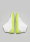 Rückansicht des V4 White Leather w/Lime high top sneakers, dargestellt vor einem grauen Hintergrund.