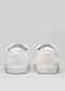 white premium leather slip-on sneakers with straps in clean design backview