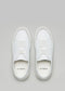 A pair of Start with a White Canvas low top d'verge slip-on sneakers viewed from above on a light gray background.