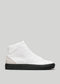 V1 White Leather w/Bone high-top sneaker with a black sole, displayed against a grey background.