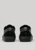 black premium leather low pair of sneakers in clean design backview
