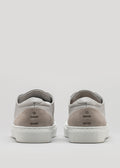 light grey premium leather low pair of sneakers in clean design backview