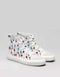 Un par de dead or alive 5/5 custom high-top sneakers con un colorido estampado de pequeñas figuras sobre fondo gris.