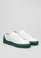 white and emerald green premium leather low sneakers in clean design frontview