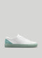 blanco y verde pastel cuero premium bajo sneakers en diseño limpio sideview
