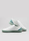 white and pastel green premium leather low sneakers in clean design stacked